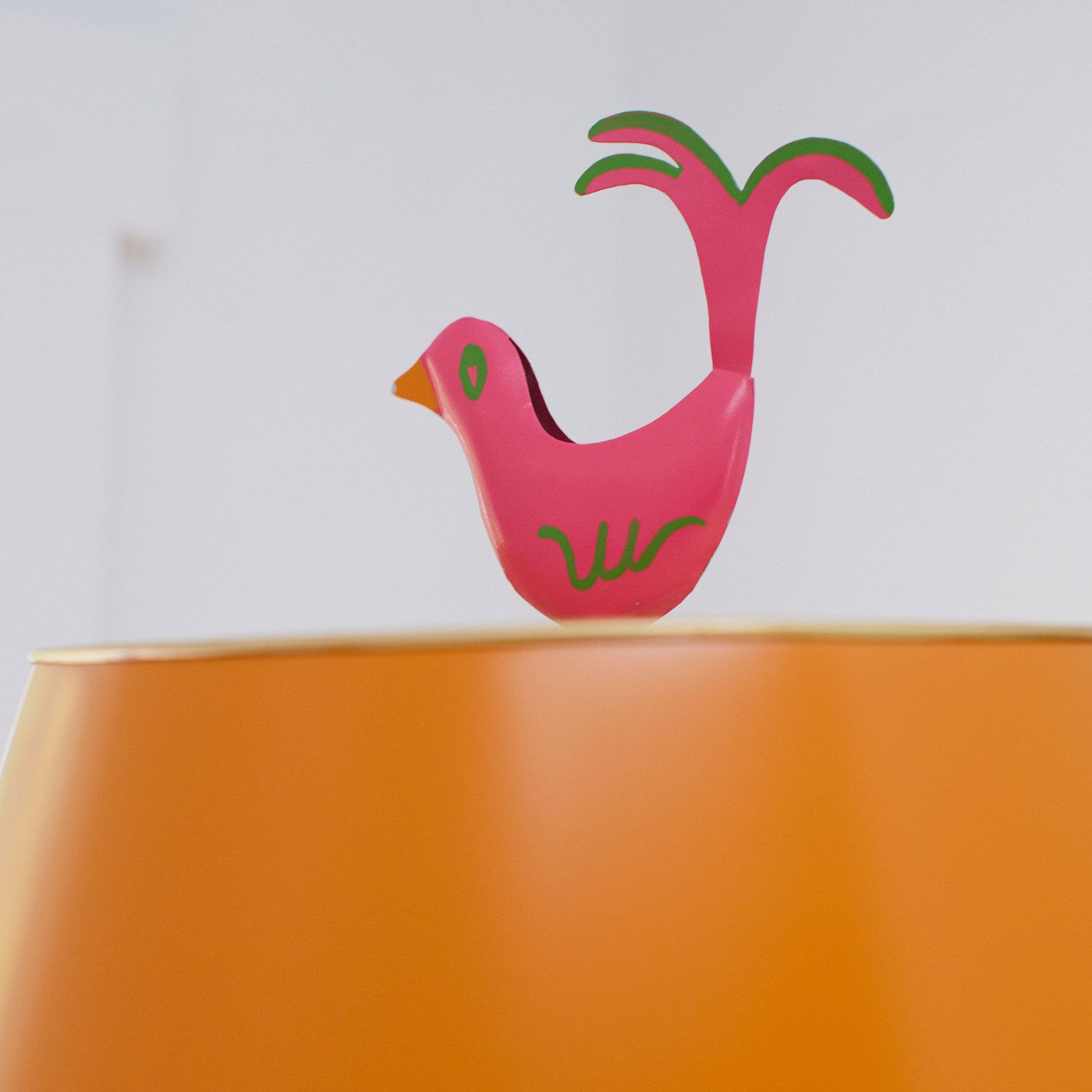 Stray Dog Designs scalloped shade in orange, pink bird finial